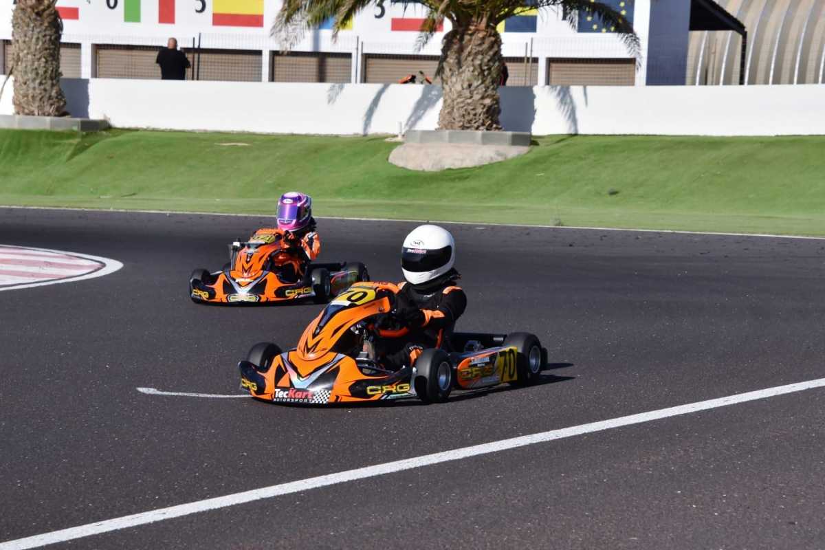 two people driving a go-kart in maspalomas