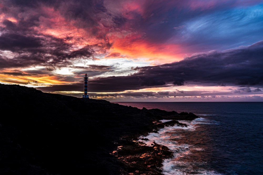Lighthouse on Gran Canaria in Sunset: Faro de Punta Sardina on cliffs